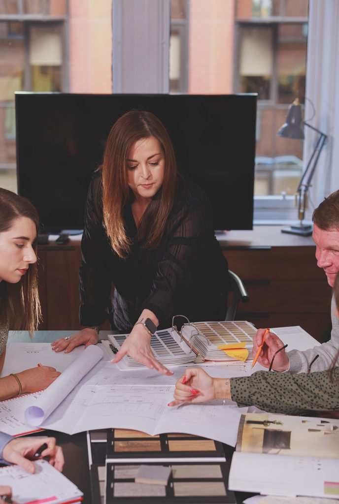 A photograph of a team meeting