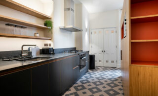 A grey contemporary kitchen design